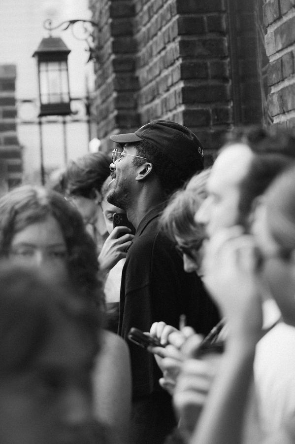 Geese show attendee laughing, Bankor's Anchor exterior